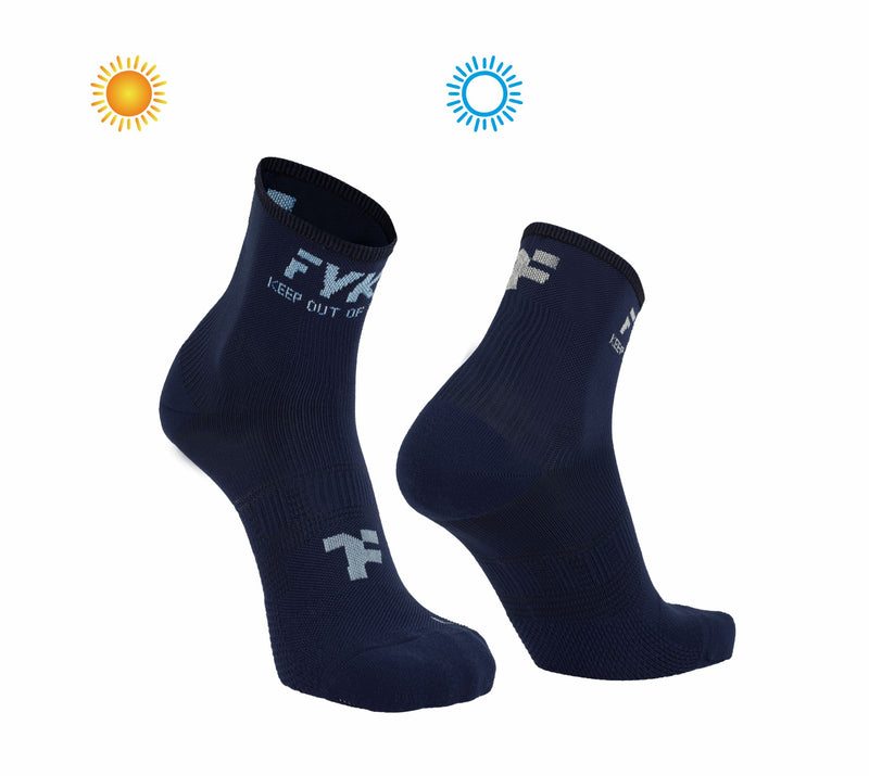 Boost Socks Low: Navy Sun Socks that change the color of the fyke logo with exposure to the sun.