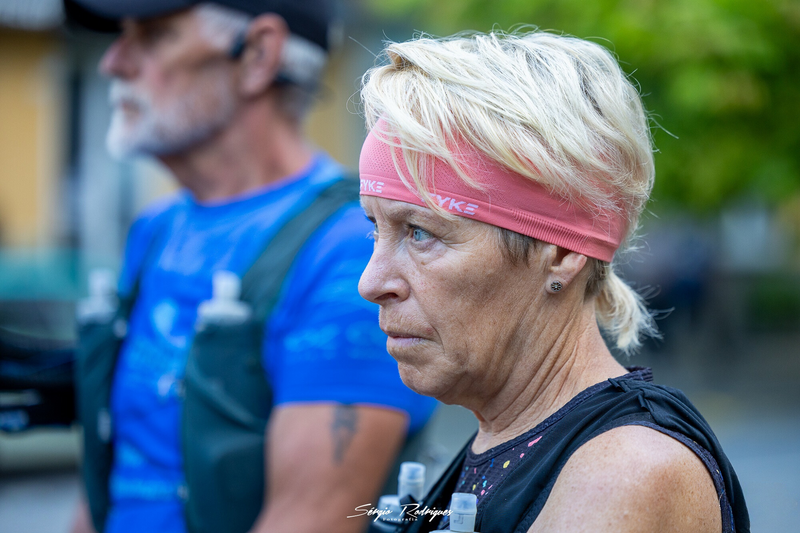 Woman wearing a coral running headband
